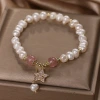 Pulsera de perlas de agua dulce natural sentido superior moda ligera extravagancia fresa cristal estrella temperamento string de mano estudiante mejor amigo decoración de la mano Application Scenario